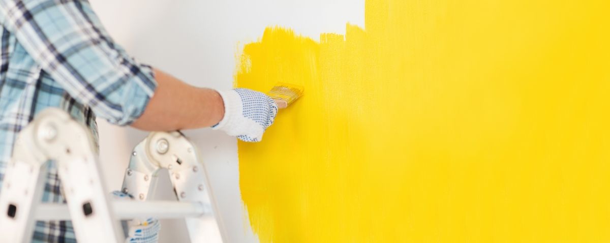 half painted yellow wall