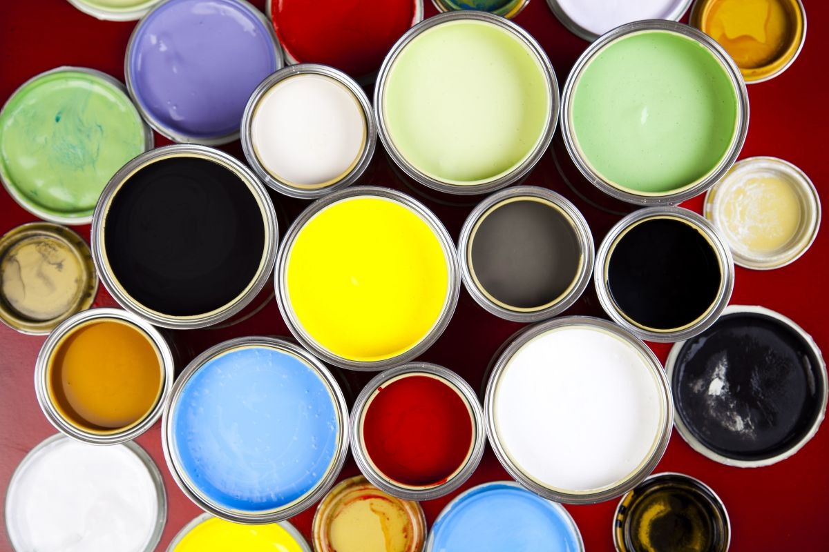 Paint cans of various colors