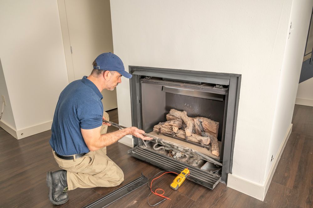 a handyman fixing up a fireplace