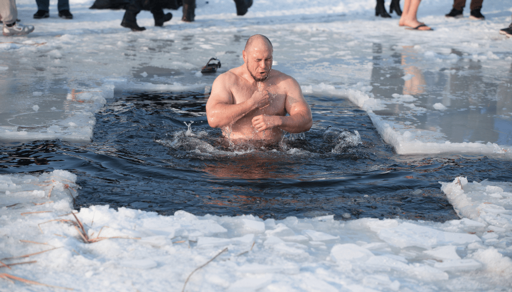 man emerging from an ice bath