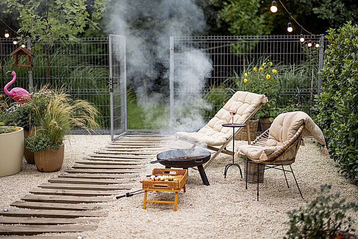 backyard with seating and a firepit 
