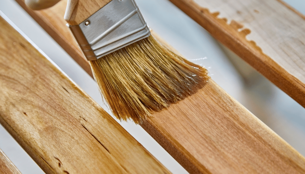Applying wood finish with a brush