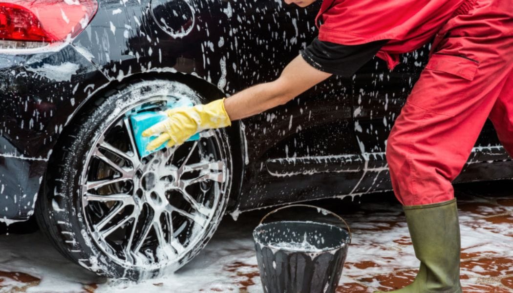 Car being cleaned at a car wash centre