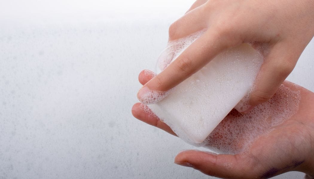 Holding a Foamy soap 