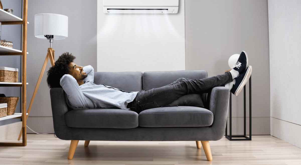 man chilling on couch