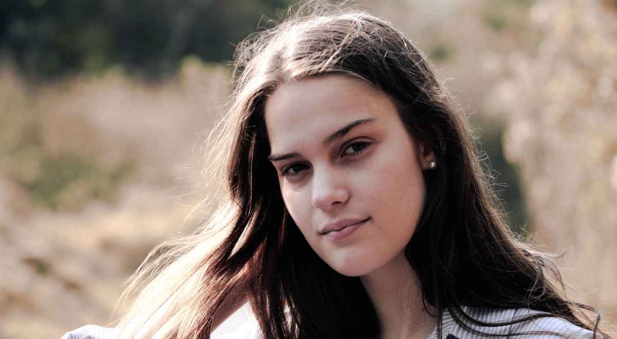 A girl smiling at the camera 