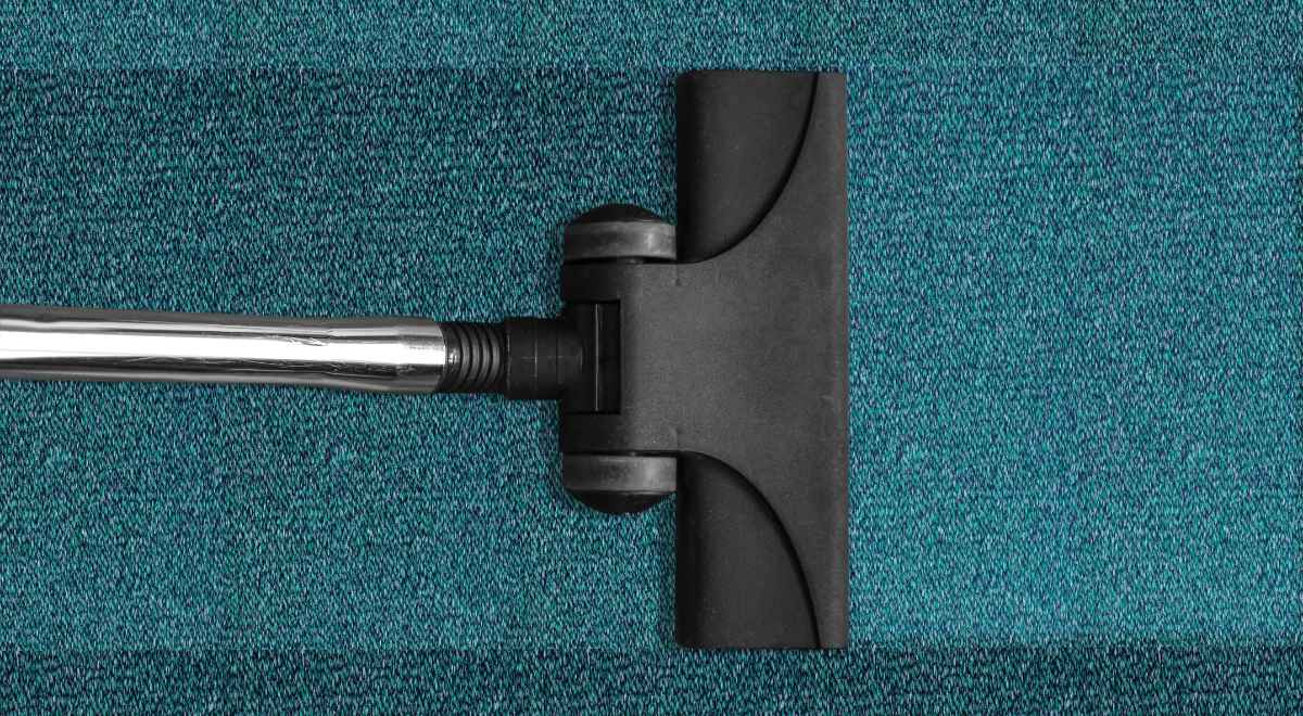 vacuuming carpet