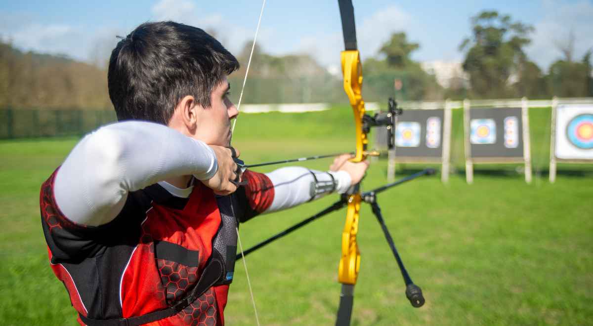 A boy practicing archery