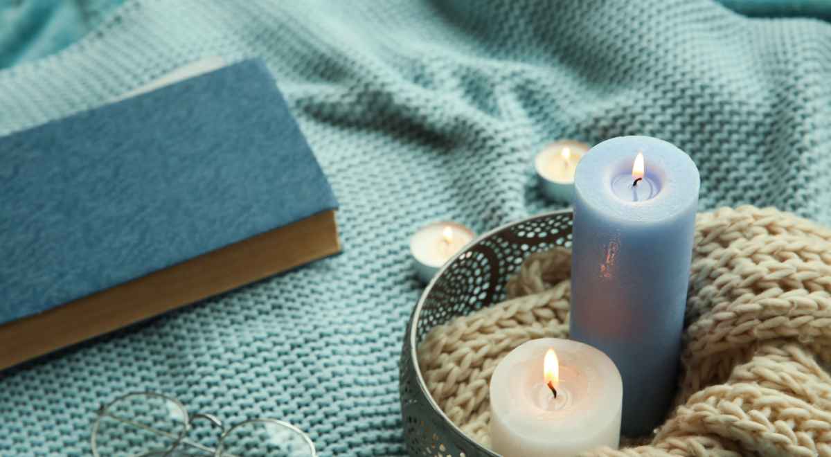 blue candles and books 