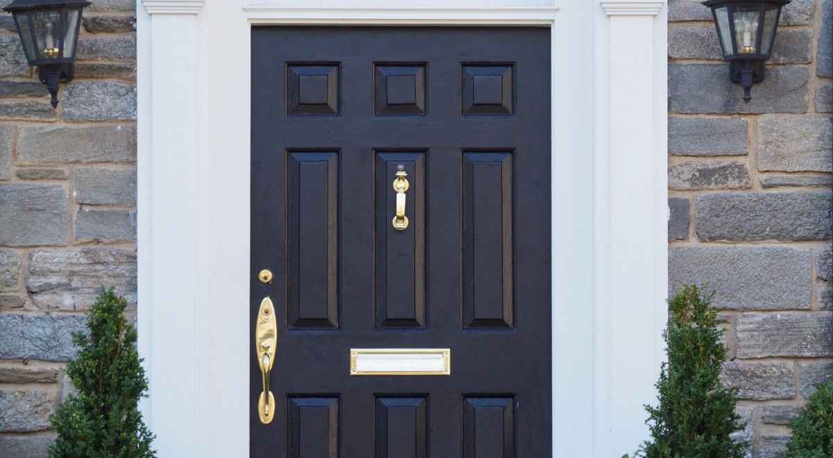 front door with golden color fittings