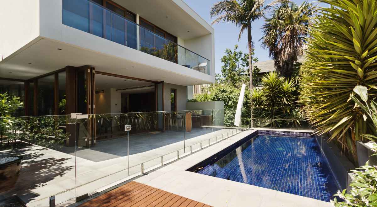 Contemporary design with the cutout for the pool, the window and the wide beam overhead