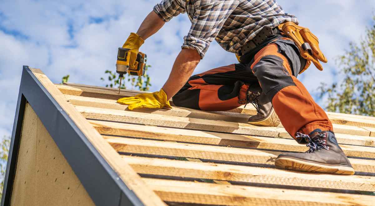 a man working on house construction