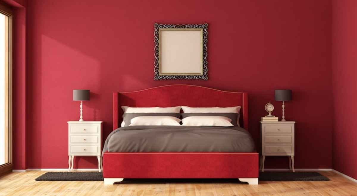 a bedroom with a red theme