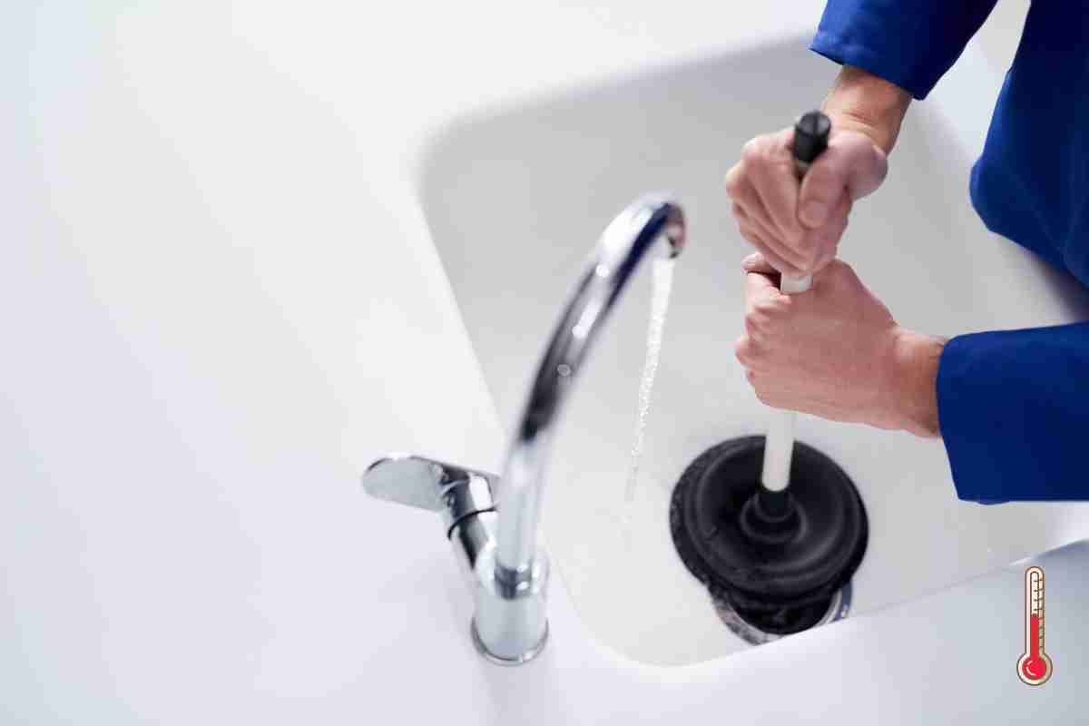 Use hot water to clean the drain instead of chemicals