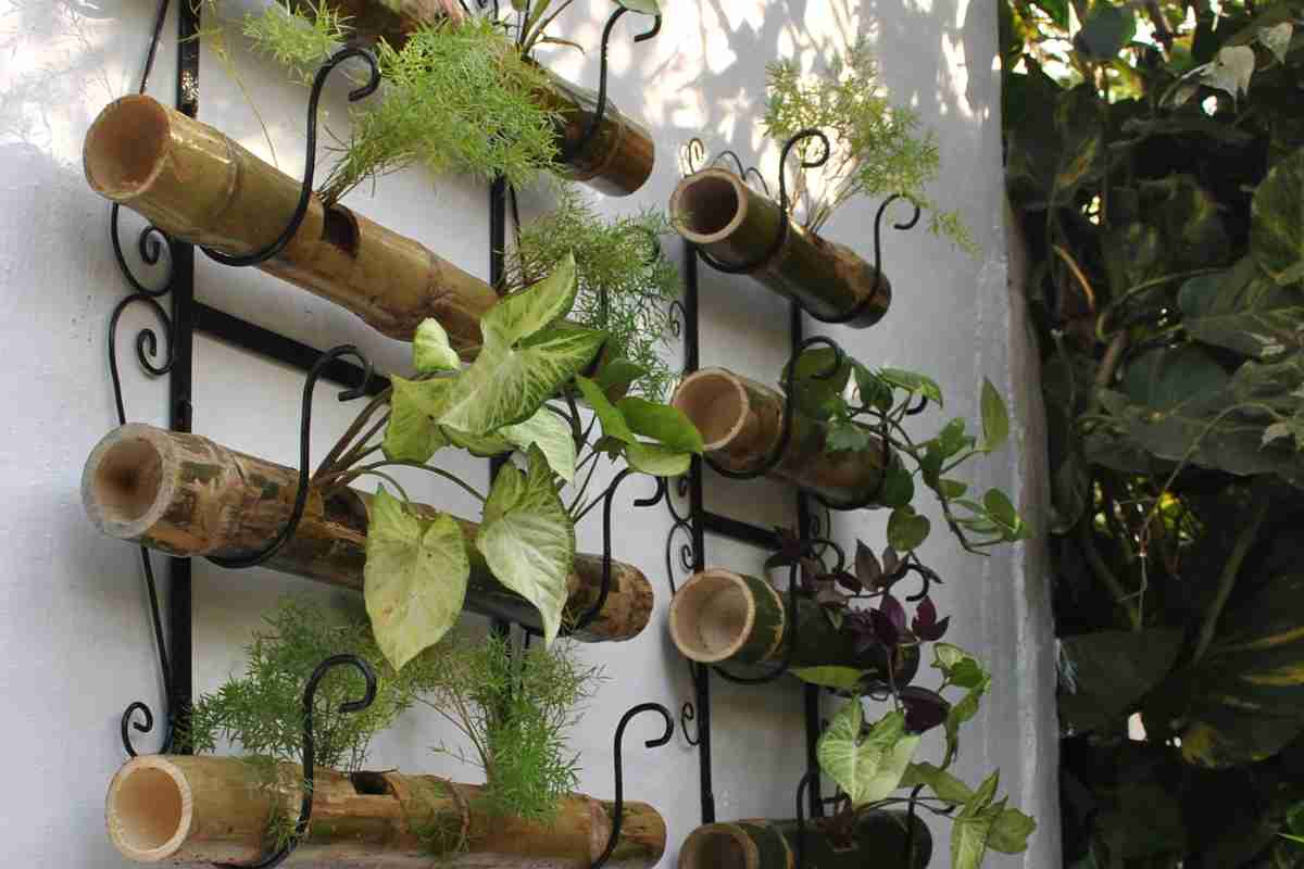 Wall mounted bamboo and wrought iron planter