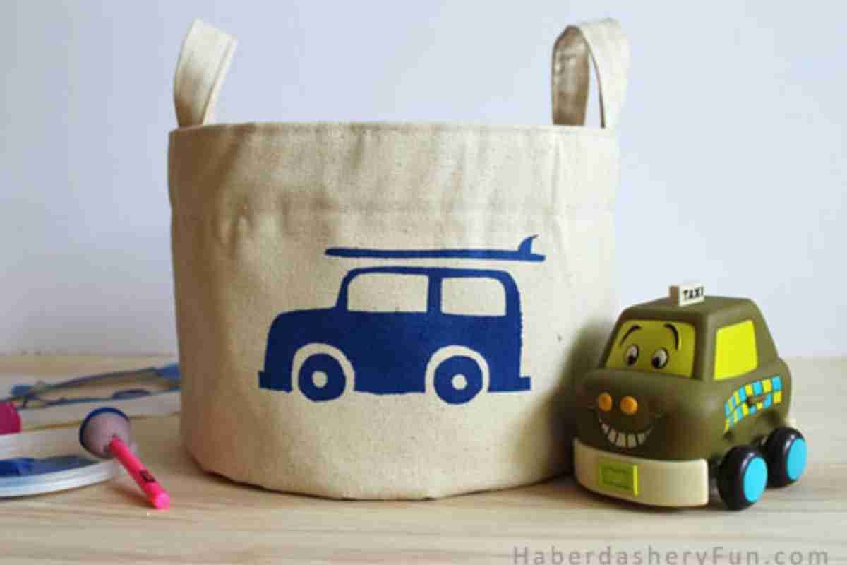 Canvas toy basket with painted car motif