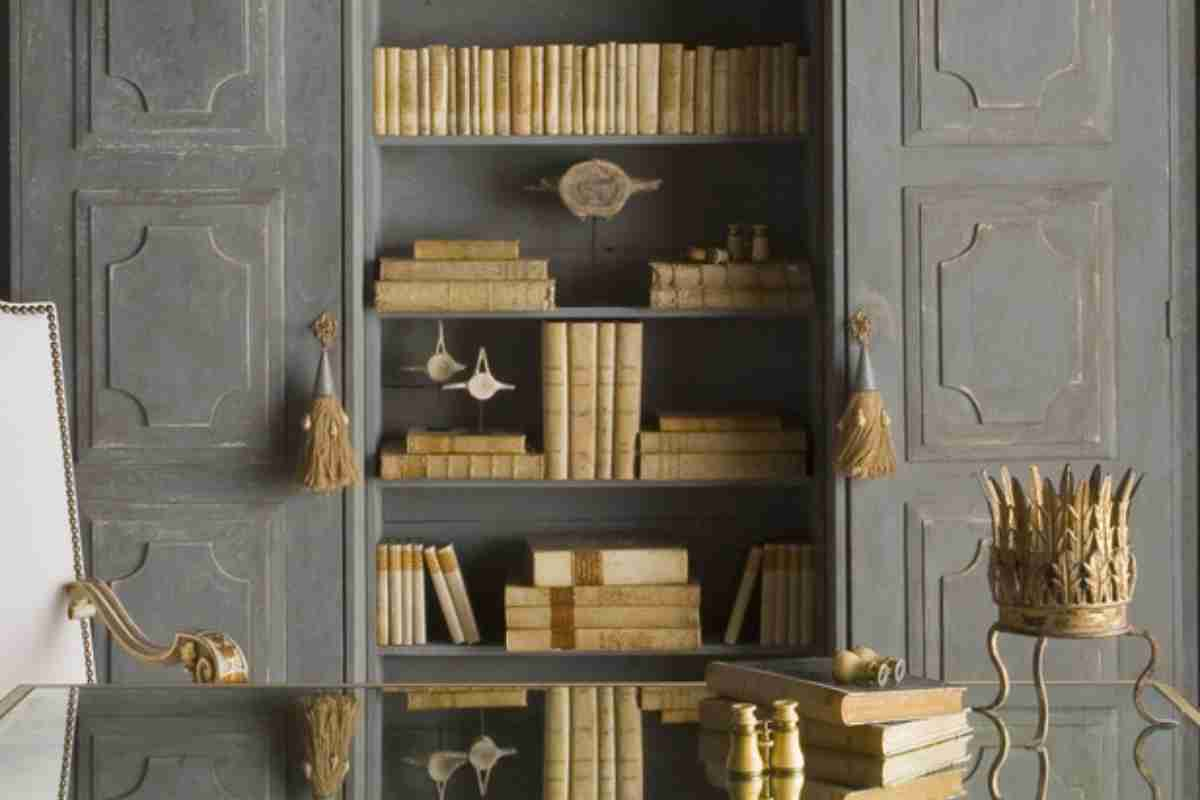 Books displayed in a French styled study