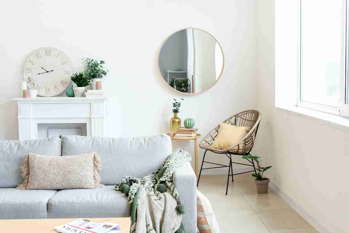 A wall of mirrors in a living room