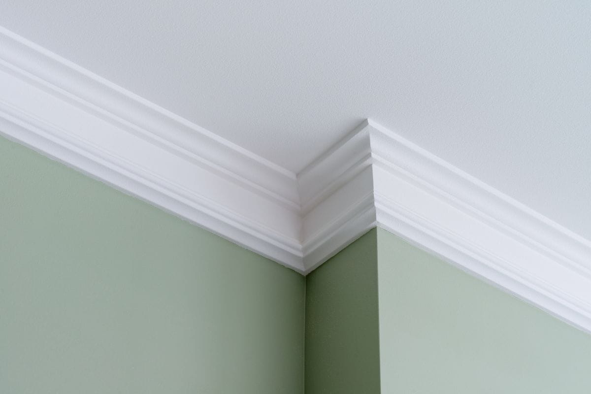 Put crown molding on the corners of the walls