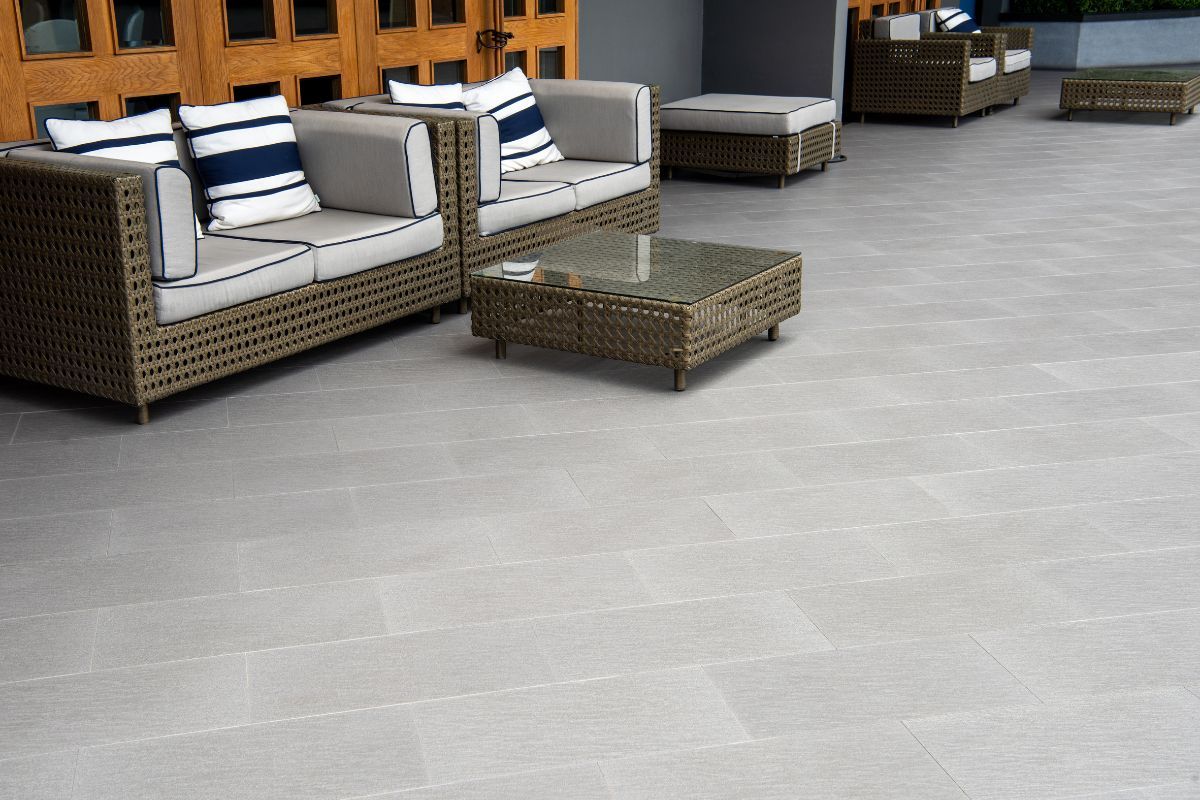 What factors should you consider when selecting tiles for the terrace?
