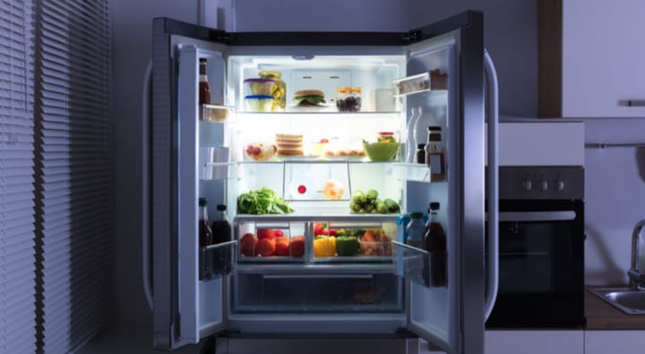 An open double-door fridge