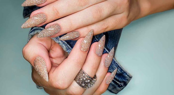 glittery nail art design on long nails