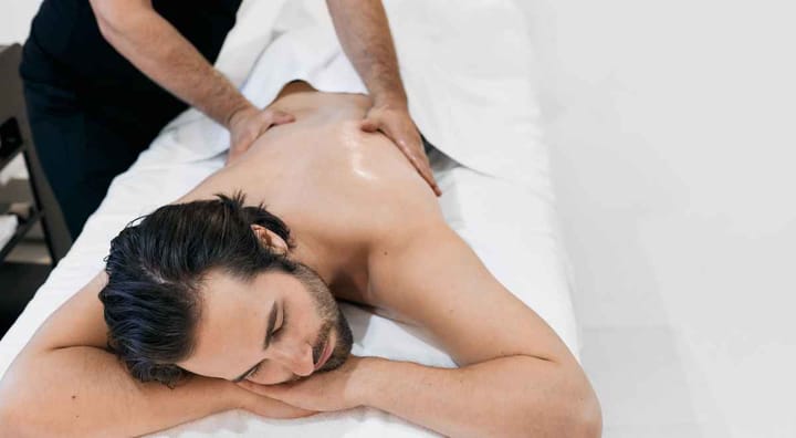 a man getting body massage