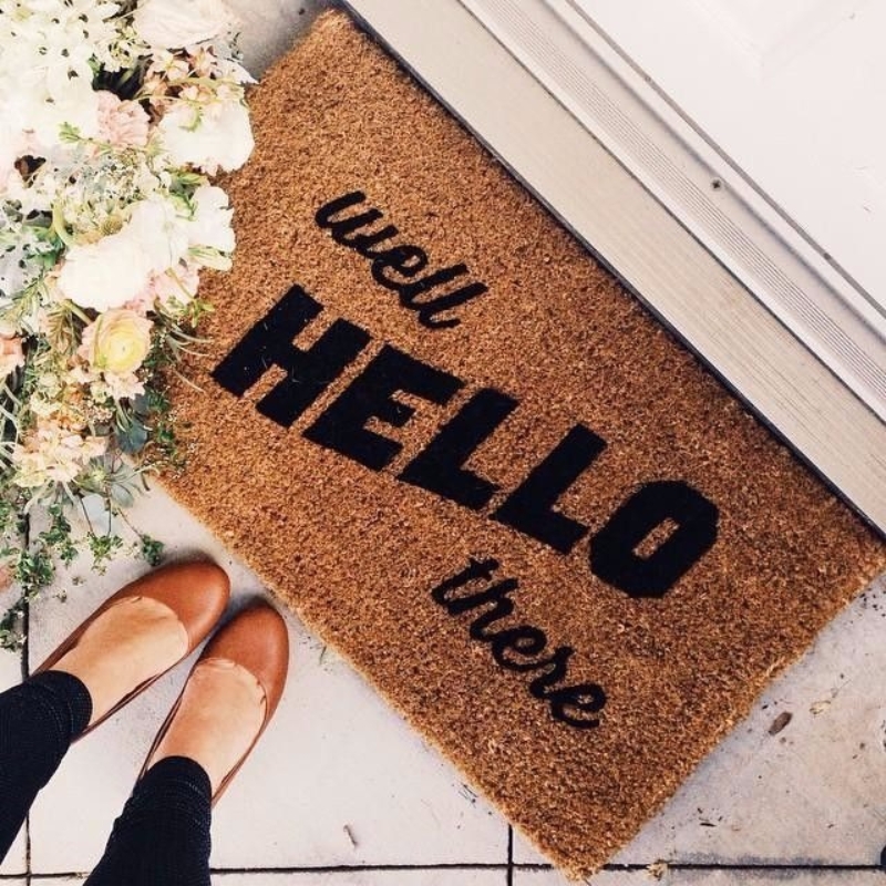 doormat with a caption