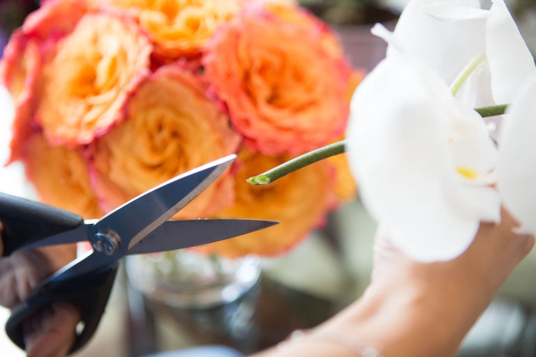 Cut the stems of your flowers at a 45-degree angle one inch from the bottom