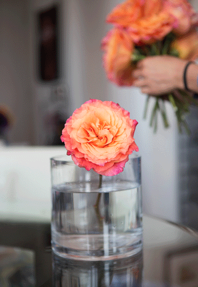 Create a grid with transparent tape to keep your flowers in place when using a shallow vase.