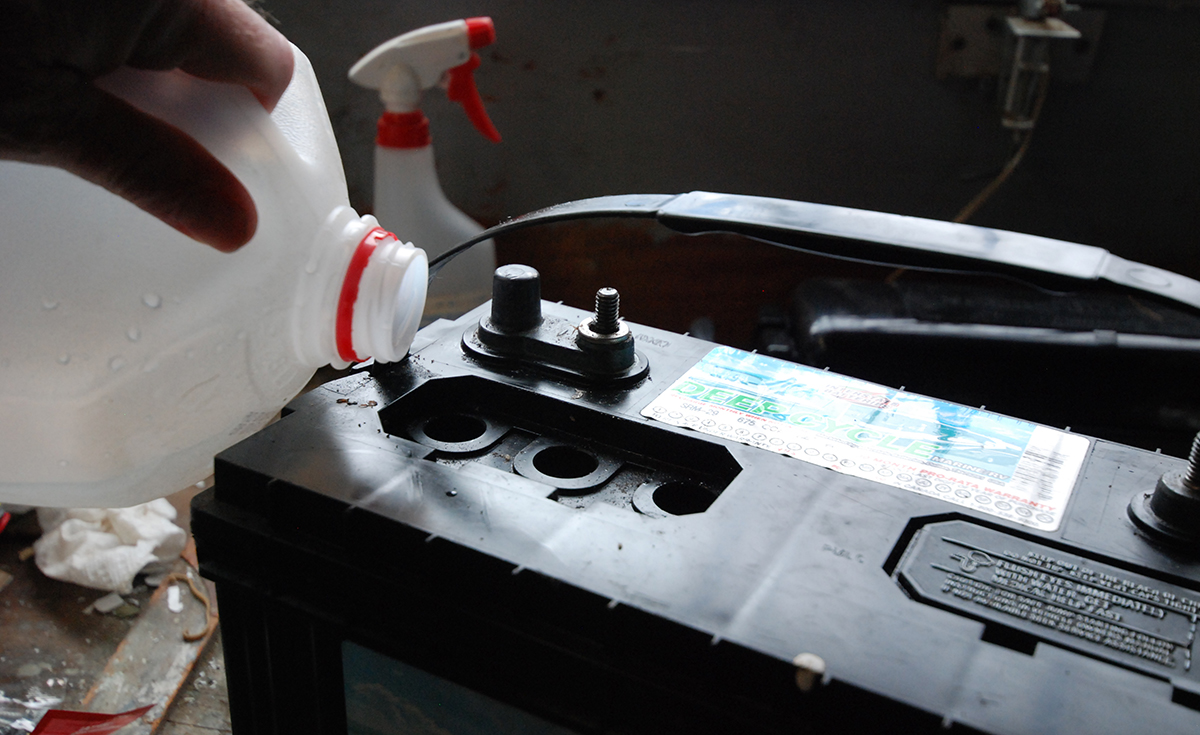 battery being filled with distilled water