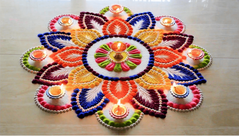 rangoli with lamps