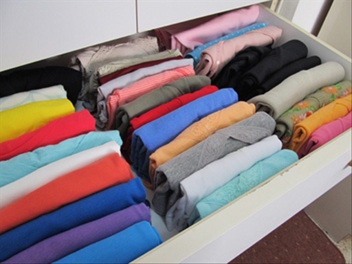 Arrange your clothes vertically in drawers.