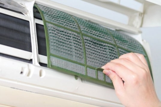 cleaning the air filter of an AC