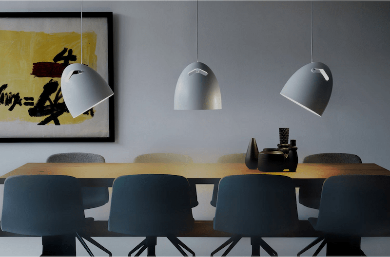 Dining table with overhead lighting