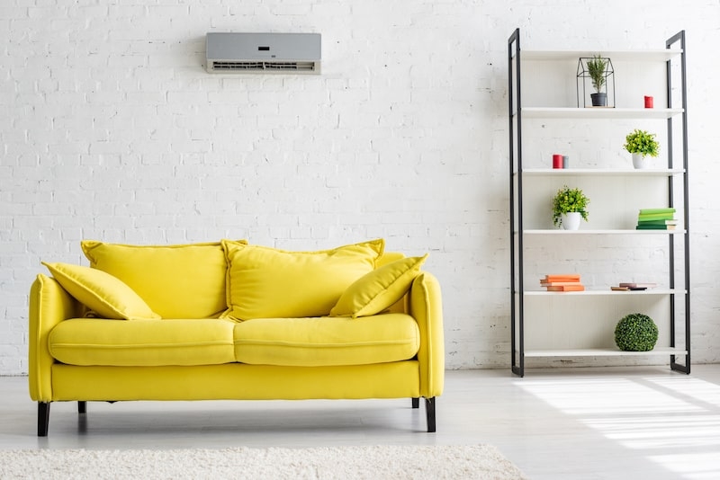 yellow sofa in a minimalistic room